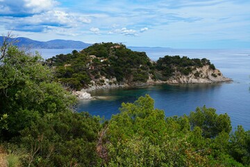 View of the landscape in Cap Benat, a cape on the Mediterranean Sea in Bormes-les-Mimosas near Le Lavandou on the French Riviera Cote d’Azur - 765980565