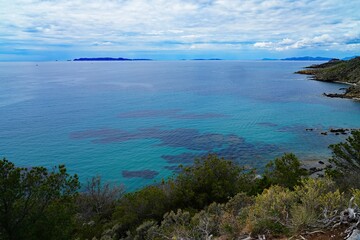 View of the landscape in Cap Benat, a cape on the Mediterranean Sea in Bormes-les-Mimosas near Le Lavandou on the French Riviera Cote d’Azur - 765980595