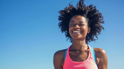 African woman runner smiling happy after running exercise on blue sky summer background