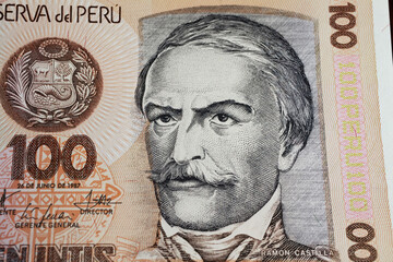 Portrait of president Ramon Castilla on  80s peruvian 100 Intis currency banknote (focus on center)