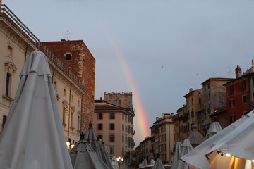 Rainbow in the evening sky after rain in Piazza delle Erbe, Verona