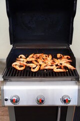 Cooking shrimp on the barbecue grill - 765993961