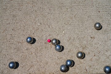 Playing a game of boules bocce ball (also called pétanque) in Provence, France - 765994147