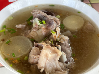 a cuisine photo of pork soup