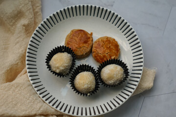 Popular cookies in Malaysia during celebration of Eid Mubarak (Hari Raya) on white background and selective focus.
