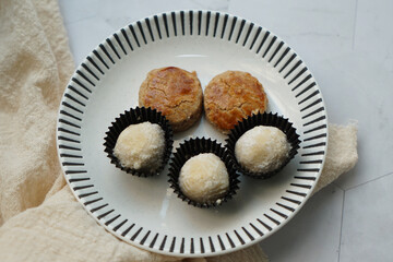 Popular cookies in Malaysia during celebration of Eid Mubarak (Hari Raya) on white background and selective focus.