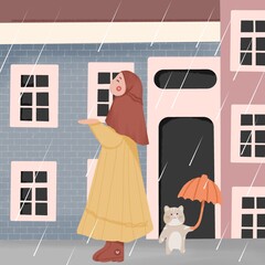 Muslim woman is in the rain with her cat
