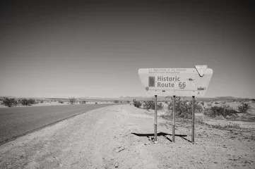 Gordijnen Historic Route 66 sign along Highway 10 in Arizona, USA.  Black and white image. © David