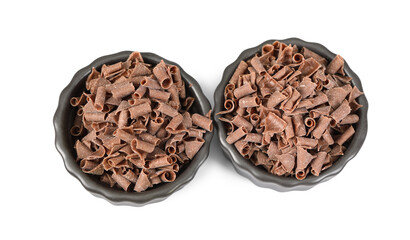 Delicious chocolate shavings in bowls isolated on white, top view
