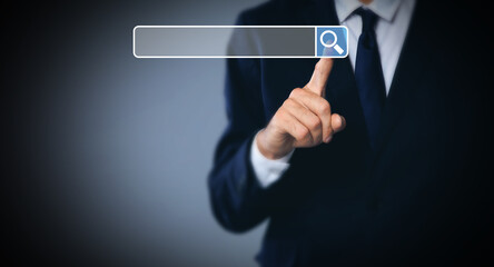 Man pointing at search bar on virtual screen against dark background, closeup. Banner design
