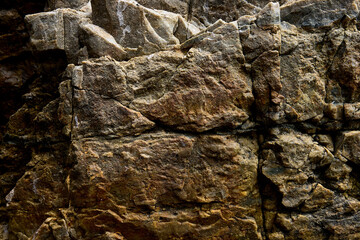 Rocks are naturally occurring solid aggregates of minerals, or in some cases, non-mineral solids like volcanic glass or coal. They are the fundamental units of Earth's crust