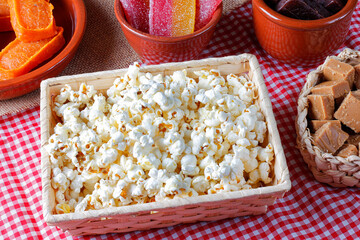 popcorn in basket on party table. Traditional sweet from Brazilian country festivals