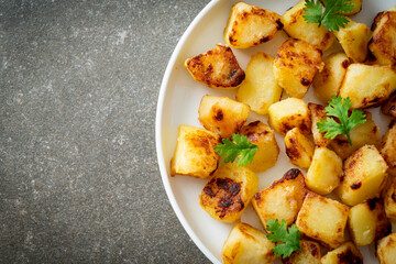 Roasted or grilled potatoes  on plate