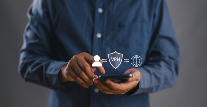 VPN, Virtual private network protocol concept. Person using smartphone with VPN icon on virtual screen for connect to VPN network..