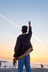 Boy looking at the sunset
