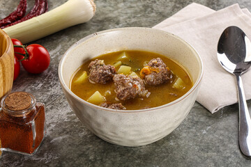 Soup with beef meatball and vegetables