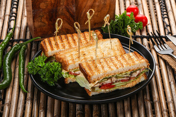 Club sandwich with chicken cheese and salad