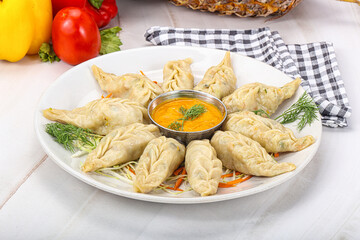 Steamed asian dumpling momo with meat