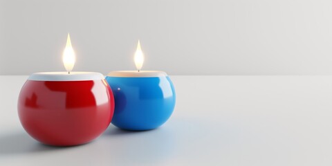 Obraz na płótnie Canvas Red and blue ceramic candle holders with lit candles, set against a clean white backdrop.