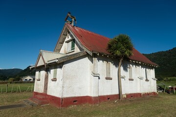 Abandoned church along the coastal drive of  Bay of Plenty, New Zealand. - obrazy, fototapety, plakaty