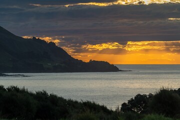 Coastline at sunset. Bay of Plenty, New Zealand.
