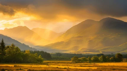 Papier Peint photo Orange the tranquility of nature with a breathtaking landscape shot of a mountain range bathed in golden sunlight