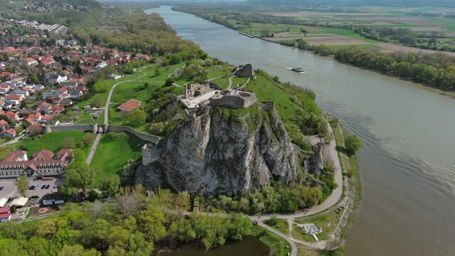 Aerial around view of ruin castle Devin. Confluence of Danube and Morava rivers, Bratislava, Slovakia, 4k
