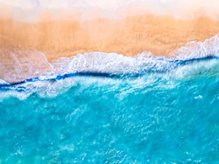 Foto auf Acrylglas Amazing Top view sea beach landscape background,Summer sea waves crashing on sandy shore seascape background,High angle view ocean nature background © panya99