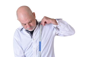 portrait of charming man taking measurements in white shirt with gray beard
