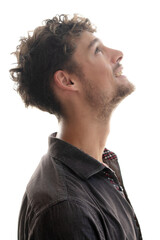 A profile portrait capturing a man gazing upward