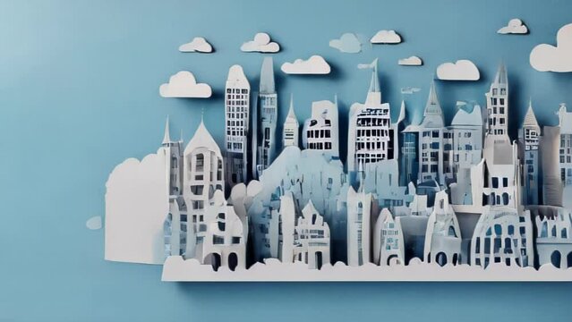 Three-dimensional cut-out art of an urban cityscape crafted in white paper, with buildings and homes layered, and clouds depicted in the background.

