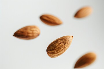 almond nut Beautiful floating healthy food white isolated