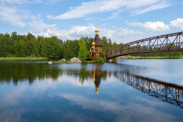 Church of the Apostle Andrew the First-Called on the Vuoksa River in a June landscape. Leningrad region, Russia - obrazy, fototapety, plakaty