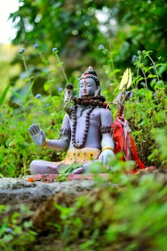 Statue of the "Lord Shiva" in the forest mountains of Nepal in lower Himalayan ranges. This place is considered as worshipping place for several local people and tourists from around the World.