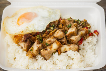 Crispy pork with chili salt and fried egg