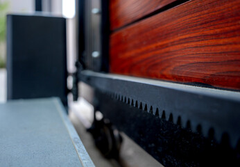 Automatic sliding front gate at modern villa