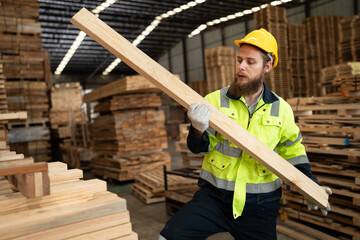 Caucasian businessman working with checking timber stock at warehouse	 - 766118100