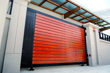 Automatic sliding front gate at modern villa