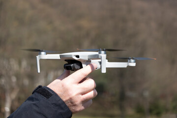 Remotely controlled drone with camera system in full operation