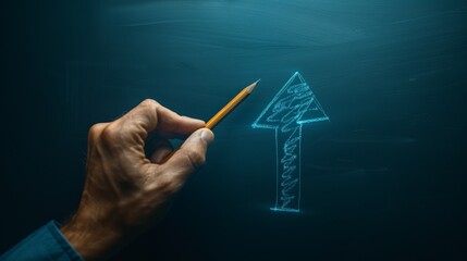 Hand of businessman drawing up arrow with pencil on dark blue background
