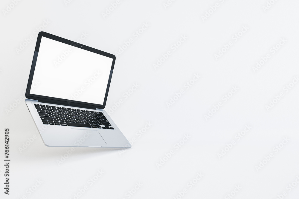 Poster Silver laptop with black keys and blank screen on white background. Productivity concept. 3D Rendering
