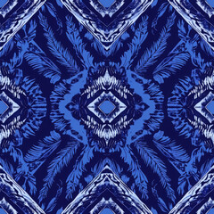 A blue and white patterned fabric with a blue and white design of a palm tree