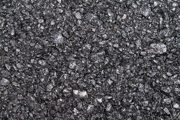 Dark new asphalt texture background. Top view