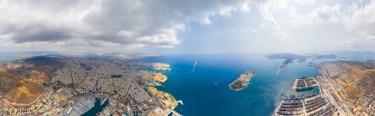 Athens, Greece. Cargo port. Container ship at the pier. Summer. Panorama 360. Aerial view
