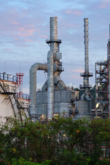 Industry Oil refinery oil and gas refinery background, Business petrochemical industrial, Refinery oil and gas factory power and fuel energy, Ecosystem estates. Fuel refinery industry at morning light