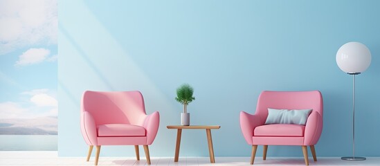 Fototapeta premium A setting with two pink chairs, a table, and a lamp in a vibrant blue room, creating a cozy and stylish ambiance
