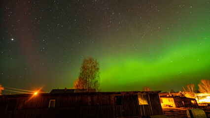 colorful northern lights, view from the window, northern lights in spring