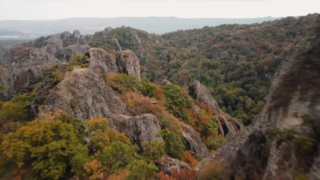 Aerial landscape Birtvisi canyon in Georgia surrounded by rocky cliffs dense forests and towering mountains. Drone footage of Caucasus nature which is perfect destination for hikers and adventurers