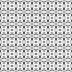 Seamless pattern based on traditional folk art ornaments. Boho style. Black and white.