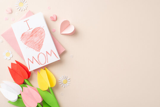 Crafted with love for Mom. Overview of paper crafted tulips, a handmade greeting with youthful handwriting, heart shapes, and fine confetti on a pastel beige canvas, with area for custom text